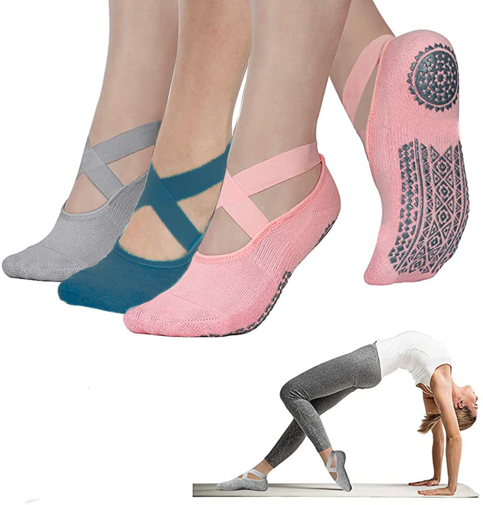 Set of three pairs of yoga socks with a woman demonstrating their use on a white background.