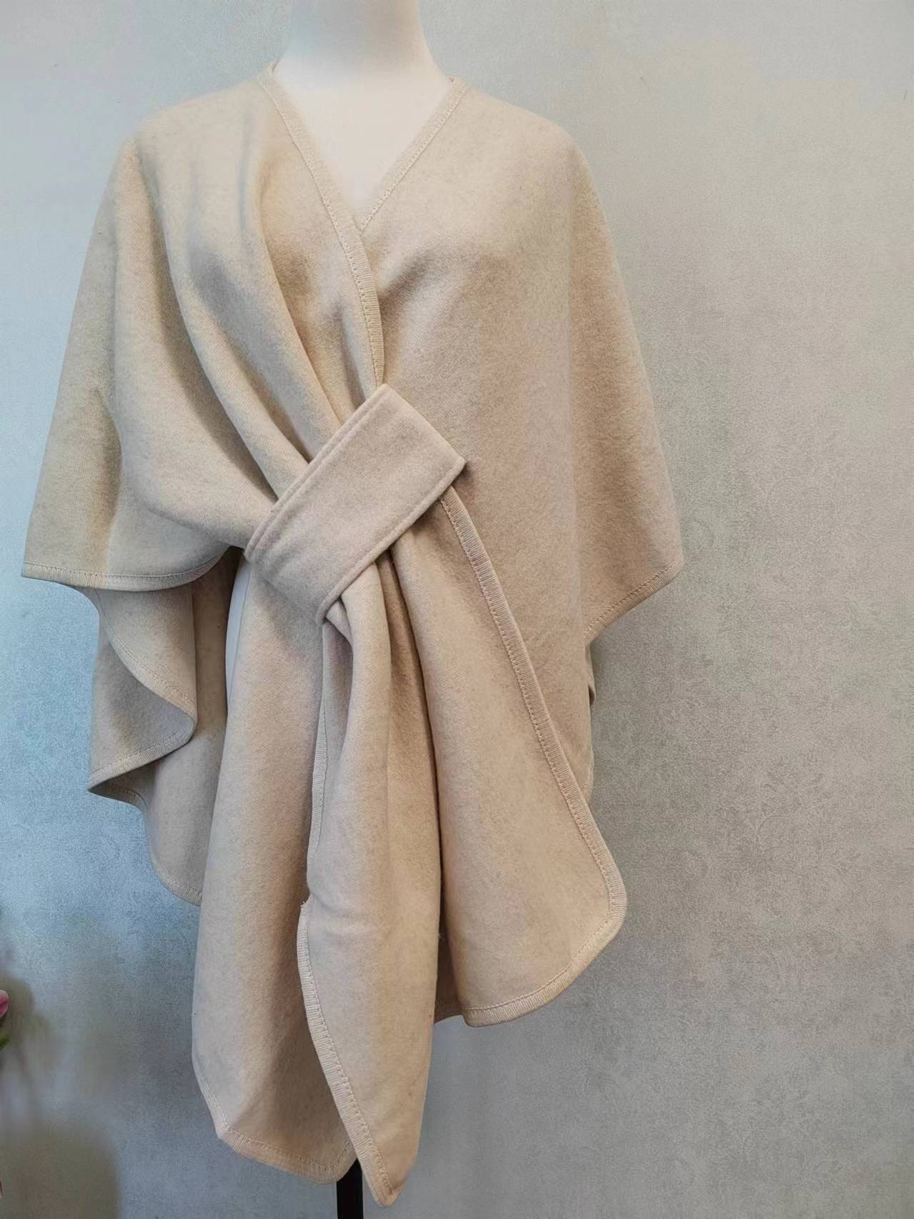 Women's Cotton Twill Cardigan Cape And Shawl displayed on a mannequin, showcasing its elegant design and styling.
