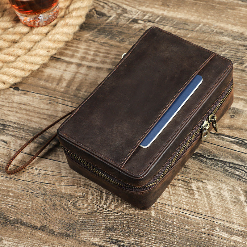 Indulge in the luxurious Handmade Leather Double Zipper Cigar Humidor, a perfect present for any occasion. This exclusive accessory will keep your cigars fresh, elevating your smoking experience to new heights.