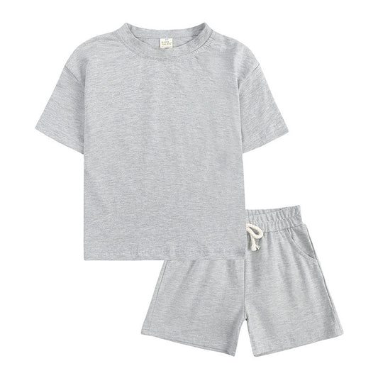 Kid's 2 pc Shorts and T-shirt Sets in gray, featuring a short-sleeve shirt and matching shorts for warm weather comfort.