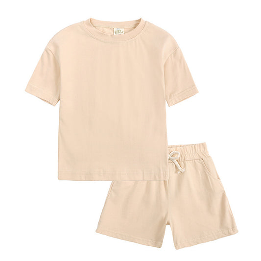 Kid's 2 pc Shorts and T-shirt Sets in neutral color, featuring breathable cotton fabric for summer comfort.