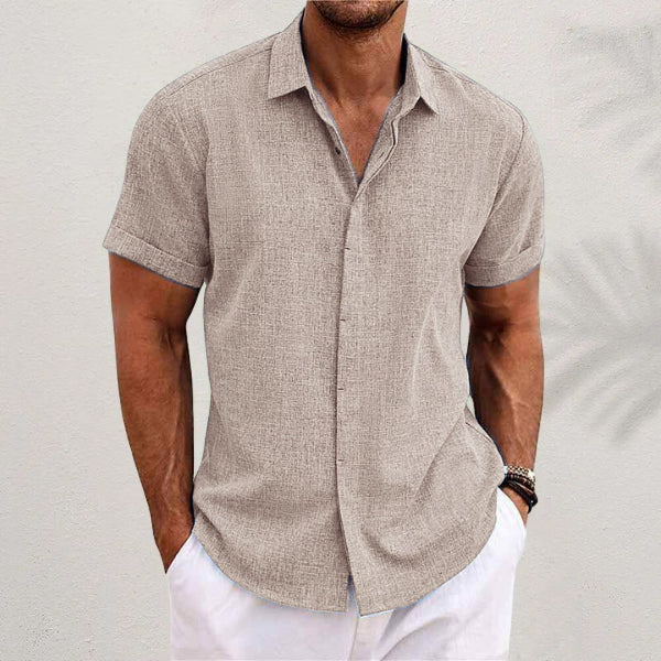 Men's linen short-sleeve t-shirt in green, relaxed fit with short sleeves and standing collar, perfect for warm weather.