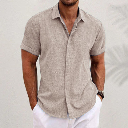 Men's linen short-sleeve t-shirt in green, relaxed fit with short sleeves and standing collar, perfect for warm weather.