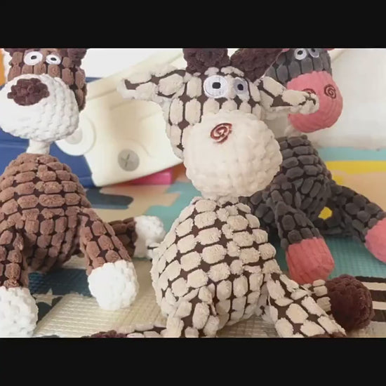 Squeaky Corduroy Chew Toys For Dogs featuring colorful animal shapes and plush textures for playful pets.