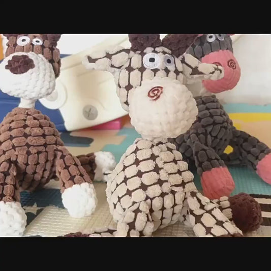 Squeaky Corduroy Chew Toys For Dogs featuring colorful animal shapes and plush textures for playful pets.